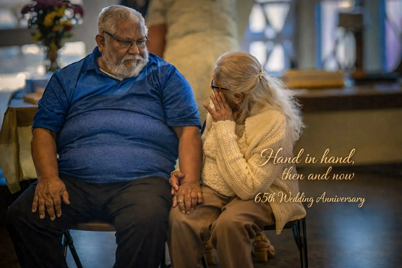 Nana and Papa holding hands during their 65th wedding anniversary celebration