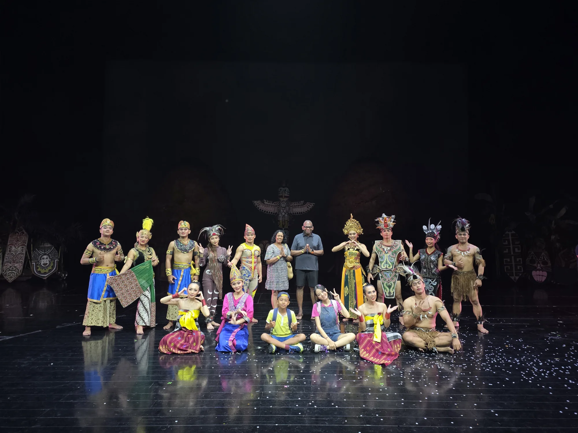 Robert and Ruky with the Devdan performers on stage in Bali