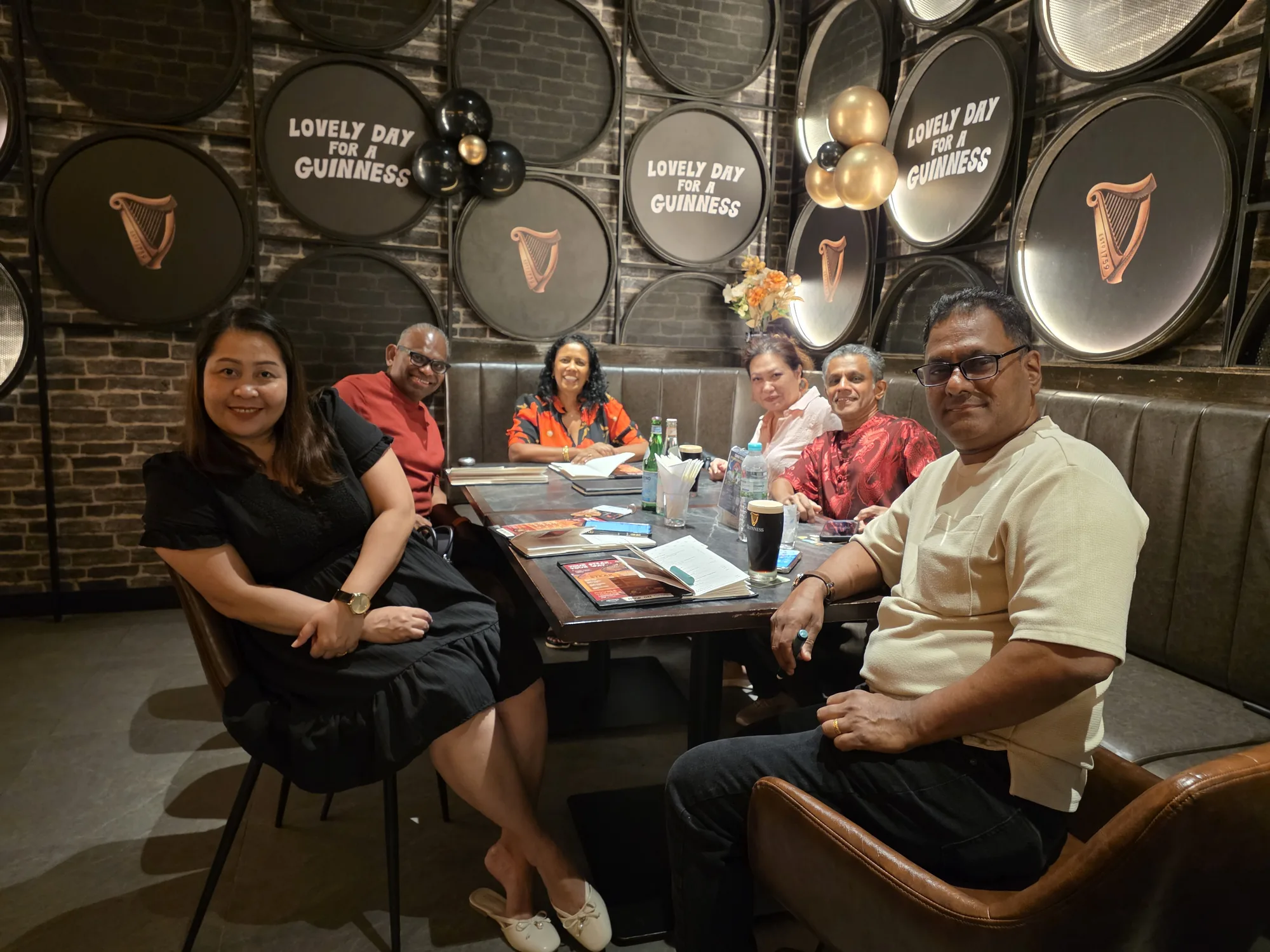 Family gathered around the table at Arthur’s Storehouse